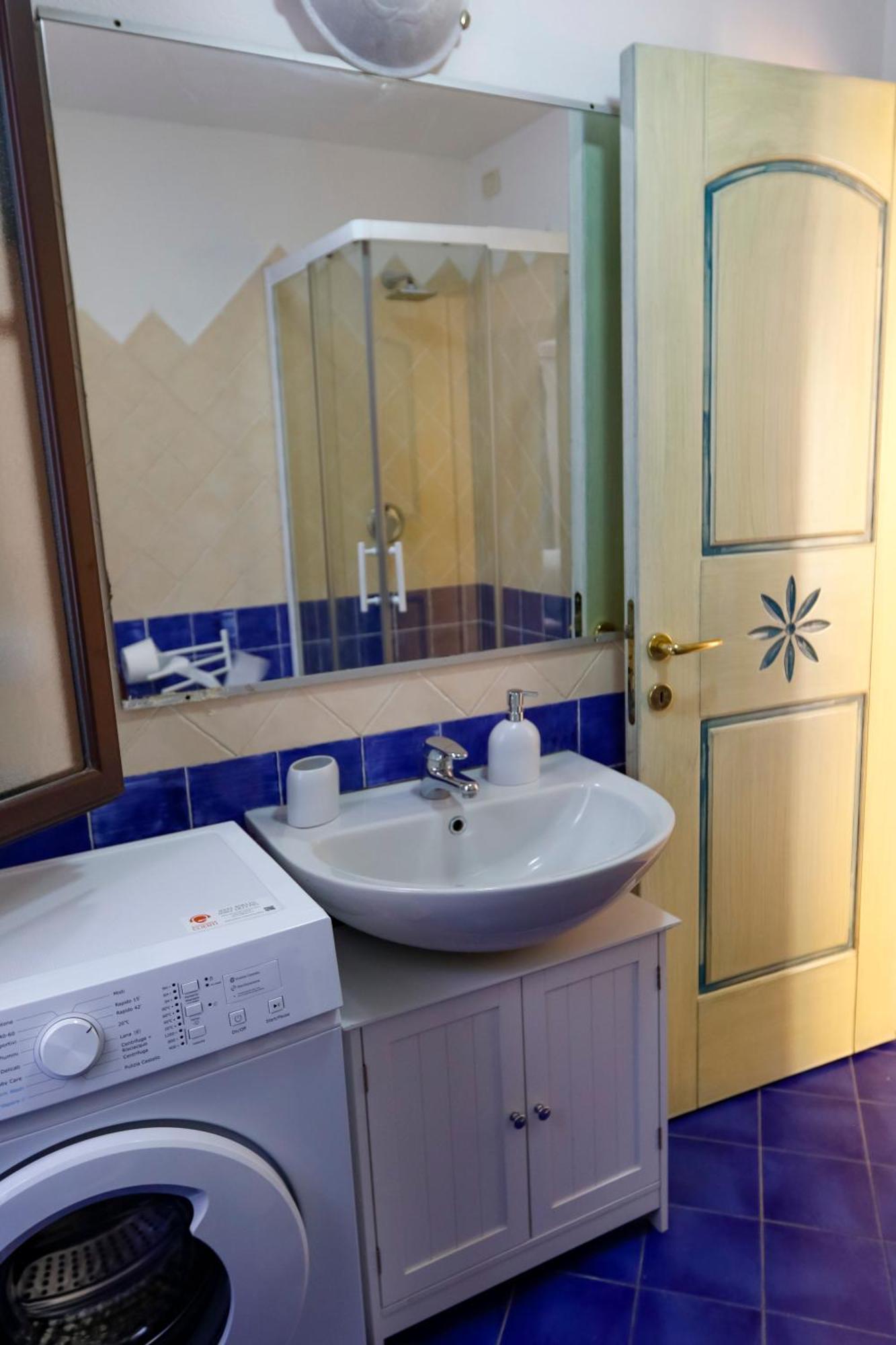 Portopollo Apartment Porto Pollo Bagian luar foto