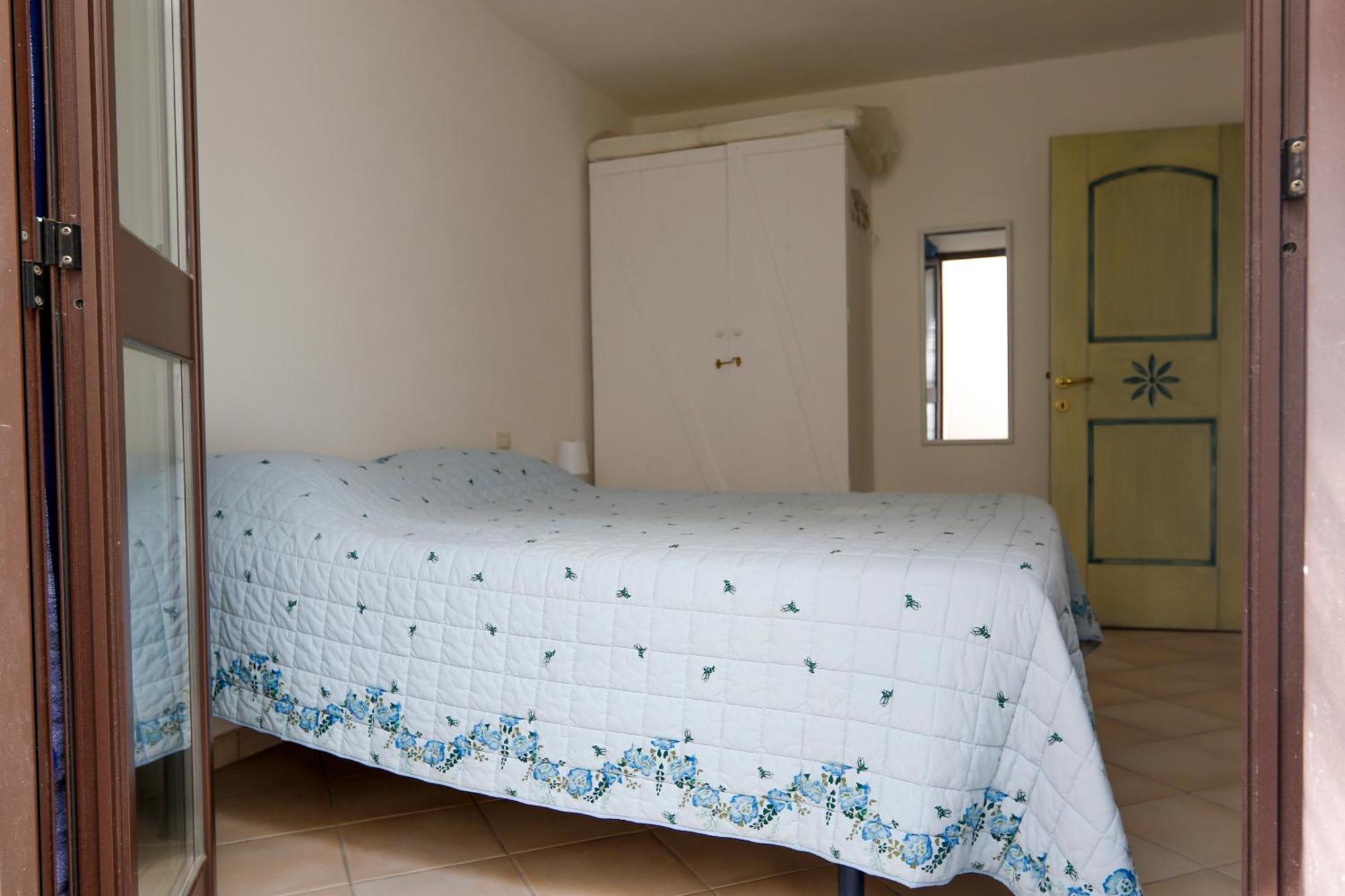 Portopollo Apartment Porto Pollo Bagian luar foto