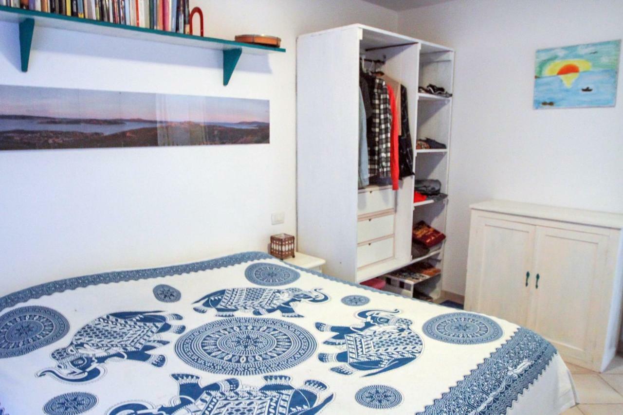 Portopollo Apartment Porto Pollo Bagian luar foto
